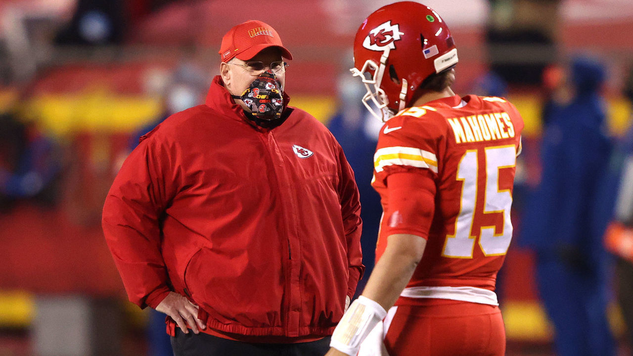KANSAS CITY, MISSOURI - DECEMBER 06: Patrick Mahomes #15 of the Kansas City Chiefs speaks with head coach Andy Reid prior to a game against the Denver Broncos at Arrowhead Stadium on December 06, 2020 in Kansas City, Missouri.
