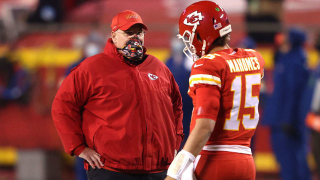 KANSAS CITY, MISSOURI - DECEMBER 06: Patrick Mahomes #15 of the Kansas City Chiefs speaks with head coach Andy Reid prior to a game against the Denver Broncos at Arrowhead Stadium on December 06, 2020 in Kansas City, Missouri.