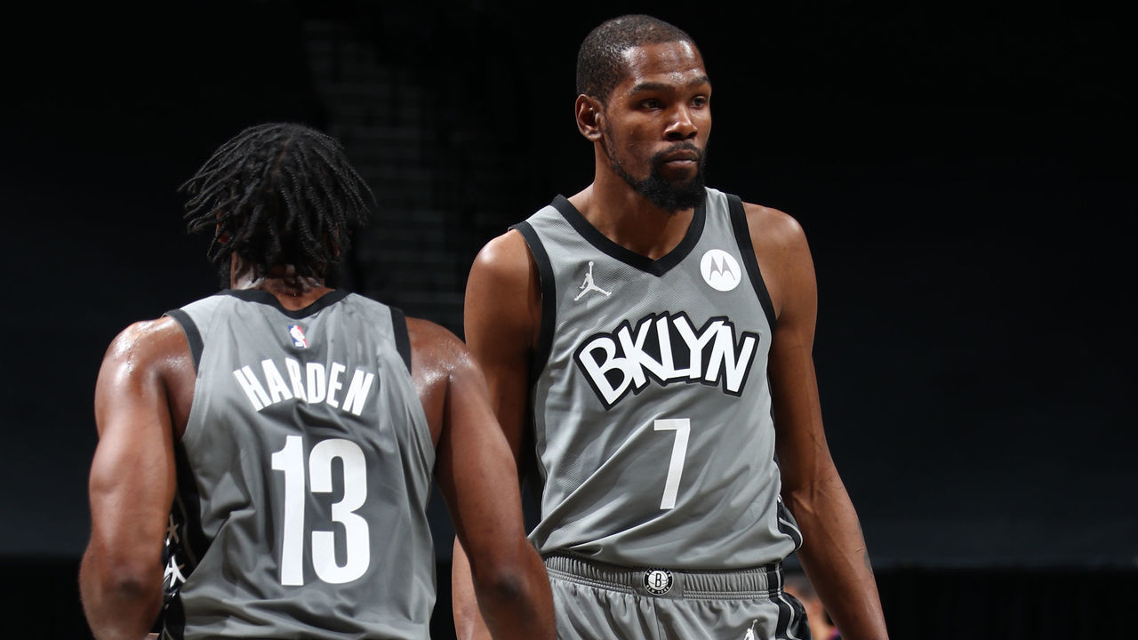 BROOKLYN, NY - JANUARY 25: James Harden #13 and Kevin Durant #7 of the Brooklyn Nets hi-five during the game against the Miami Heat on January 25, 2021 at Barclays Center in Brooklyn, New York. Mandatory Copyright Notice: Copyright 2021 NBAE
