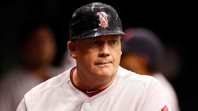 ST. PETERSBURG, FL - JUNE 15: First base coach Ron Johnson #50 of the Boston Red Sox watches his team against the Tampa Bay Rays during the game at Tropicana Field on June 15, 2011 in St. Petersburg, Florida.