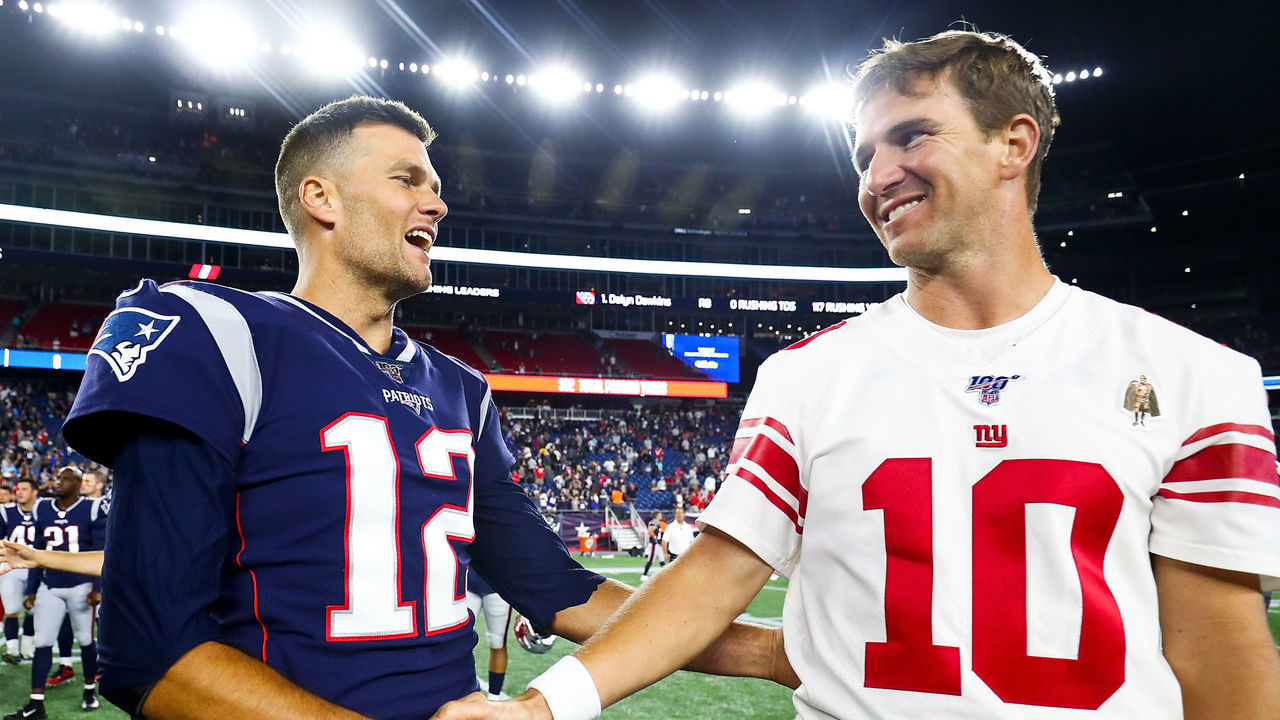FOXBOROUGH, MA - AUGUST 29: Tom Brady #12 of the New England Patriots greets Eli Manning #10 of the New York Giants after a preseason game at Gillette Stadium on August 29, 2019 in Foxborough, Massachusetts.