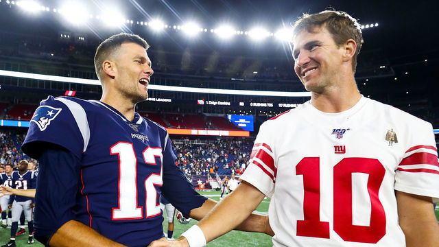 FOXBOROUGH, MA - AUGUST 29: Tom Brady #12 of the New England Patriots greets Eli Manning #10 of the New York Giants after a preseason game at Gillette Stadium on August 29, 2019 in Foxborough, Massachusetts.