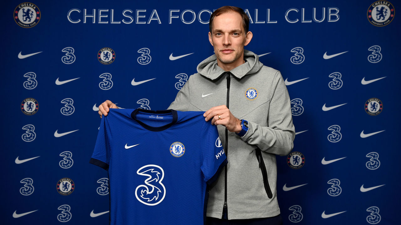 LONDON, ENGLAND - JANUARY 27: New manager Thomas Tuchel of Chelsea holds up the home Nike Shirt at Stamford Bridge on January 27, 2021 in London, England.