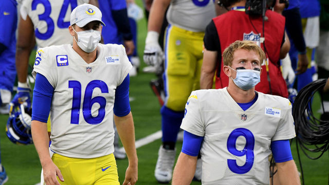 Inglewood, CA - December 20: Quarterback Jared Goff #16 along with quarterback John Wolford #9 of the Los Angeles Rams walk off the field as the New York Jets defeated the Los Angeles Rams 23-20 during a NFL football game at SoFi Stadium in Inglewood on Sunday, December 20, 2020.