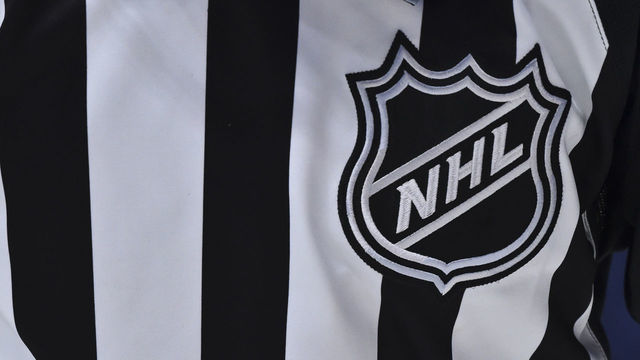 MONTREAL, QC - DECEMBER 11: The NHL crest is seen on a linesman"u2019s jersey during the game between the Montreal Canadiens and the Ottawa Senators during the third period at the Bell Centre on December 11, 2019 in Montreal, Canada. The Montreal Canadiens defeated the Ottawa Senators 3-2 in overtime.