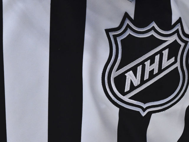 MONTREAL, QC - DECEMBER 11: The NHL crest is seen on a linesman"u2019s jersey during the game between the Montreal Canadiens and the Ottawa Senators during the third period at the Bell Centre on December 11, 2019 in Montreal, Canada. The Montreal Canadiens defeated the Ottawa Senators 3-2 in overtime.