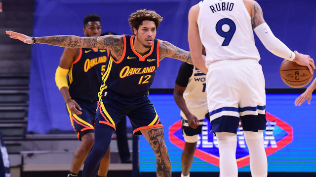 SAN FRANCISCO, CA - January 25: Kelly Oubre Jr. #12 of the Golden State Warriors plays defense during the game against the Minnesota Timberwolves on January 25, 2021 at Chase Center in San Francisco, California. NOTE TO USER: User expressly acknowledges and agrees that, by downloading and or using this photograph, user is consenting to the terms and conditions of Getty Images License Agreement. Mandatory Copyright Notice: Copyright 2021 NBAE