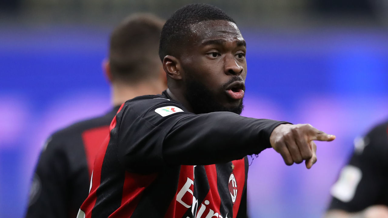 MILAN, ITALY - JANUARY 26: Fikayo Tomori of AC Milan indicates during the Coppa Italia match between FC Internazionale and AC Milan at Stadio Giuseppe Meazza on January 26, 2021 in Milan, Italy. Sporting stadiums around Italy remain under strict restrictions due to the Coronavirus Pandemic as Government social distancing laws prohibit fans inside venues resulting in games being played behind closed doors.