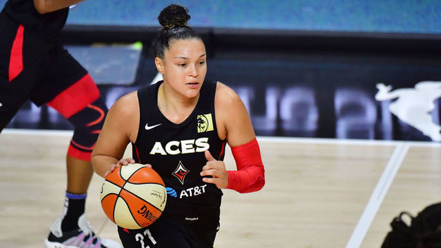 PALMETTO, FLORIDA - OCTOBER 04: Kayla McBride #21 of the Las Vegas Aces dribbles during the first half of Game 2 of the WNBA Finals against the Seattle Storm at Feld Entertainment Center on October 02, 2020 in Palmetto, Florida.