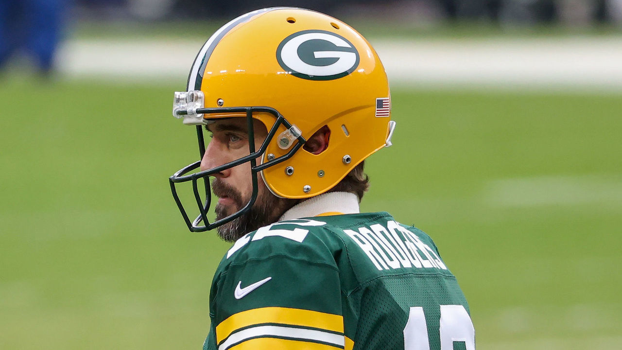 GREEN BAY, WISCONSIN - JANUARY 24: Aaron Rodgers #12 of the Green Bay Packers warms up before the NFC Championship game against the Tampa Bay Buccaneers at Lambeau Field on January 24, 2021 in Green Bay, Wisconsin.