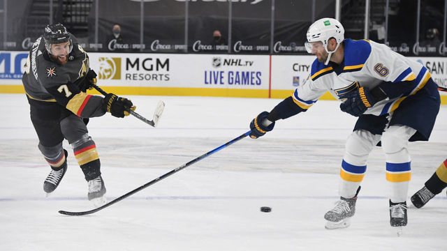 LAS VEGAS, NEVADA - JANUARY 26: Alex Pietrangelo #7 of the Vegas Golden Knights shoots against Marco Scandella #6 of the St. Louis Blues in the second period of their game at T-Mobile Arena on January 26, 2021 in Las Vegas, Nevada. The Blues defeated the Golden Knights 5-4 in a shootout.