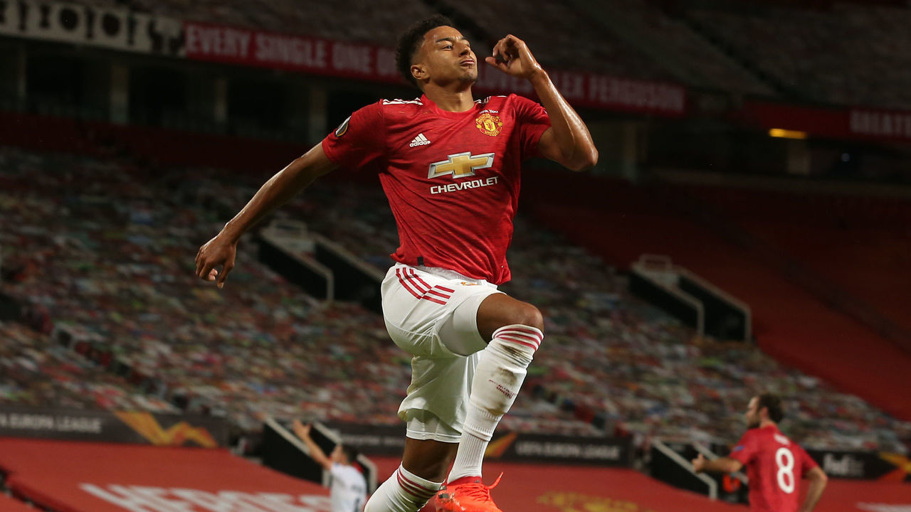MANCHESTER, ENGLAND - AUGUST 05: Jesse Lingard of Manchester United celebrates scoring their first goal during the UEFA Europa League round of 16 second leg match between Manchester United and LASK at Old Trafford on August 05, 2020 in Manchester, England.