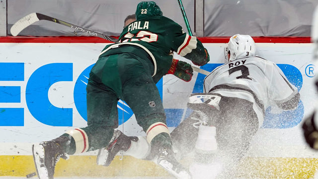 ST. PAUL, MN - JANUARY 28: Minnesota Wild Right Wing Kevin Fiala (22) is given a game misconduct penalty for this hit on Los Angeles Kings Defenceman Matt Roy (3) during the 2nd period of an NHL game between the Minnesota Wild and the Los Angeles Kings on January 28, 2021, at Xcel Energy Center, St. Paul, MN.