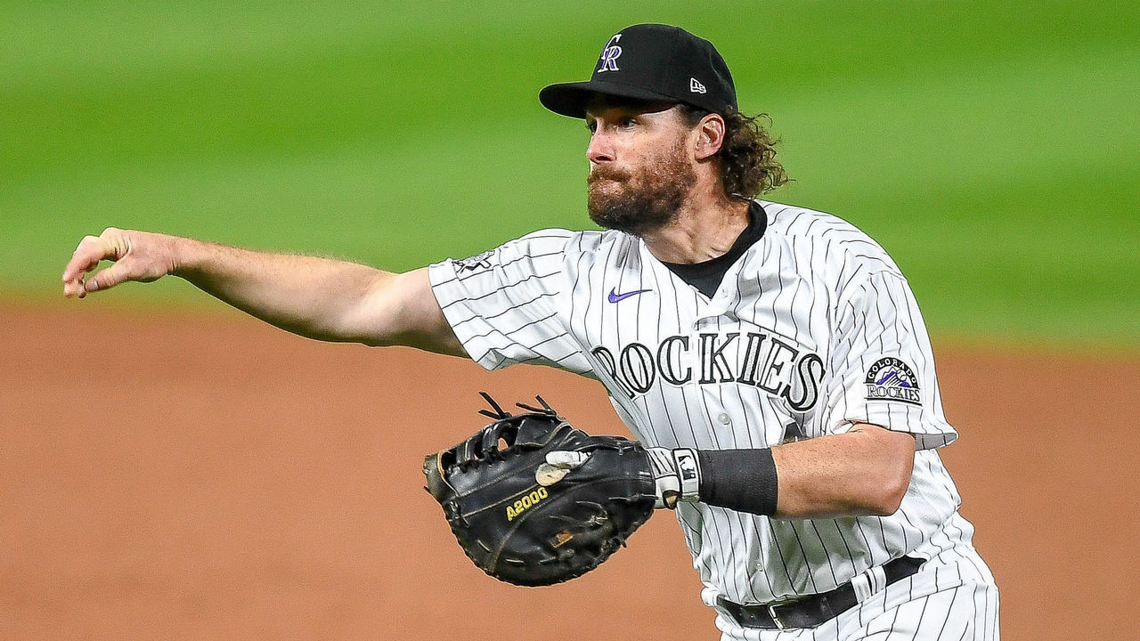 DENVER, CO - AUGUST 28: Daniel Murphy #42 of the Colorado Rockies makes a play against the San Diego Padres at Coors Field on August 28, 2020 in Denver, Colorado. All players are wearing #42 in honor of Jackie Robinson Day. The day honoring Jackie Robinson, traditionally held on April 15, was rescheduled due to the COVID-19 pandemic.