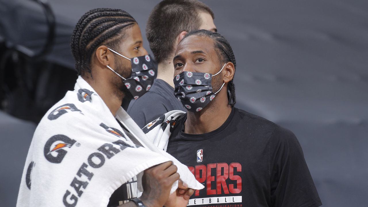 SACRAMENTO, CA - JANUARY 15: Paul George #13 and Kawhi Leonard #2 of the Los Angeles Clippers talk during the game against the Sacramento Kings on January 15, 2021 at Golden 1 Center in Sacramento, California. NOTE TO USER: User expressly acknowledges and agrees that, by downloading and or using this photograph, User is consenting to the terms and conditions of the Getty Images Agreement. Mandatory Copyright Notice: Copyright 2021 NBAE