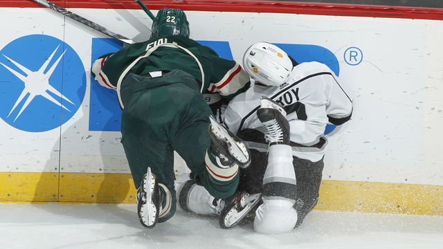 SAINT PAUL, MN - JANUARY 28: Kevin Fiala #22 of the Minnesota Wild is called for a major boarding penalty and game misconduct against Matt Roy #3 of the Los Angeles Kings during the game at the Xcel Energy Center on January 28, 2021 in Saint Paul, Minnesota.