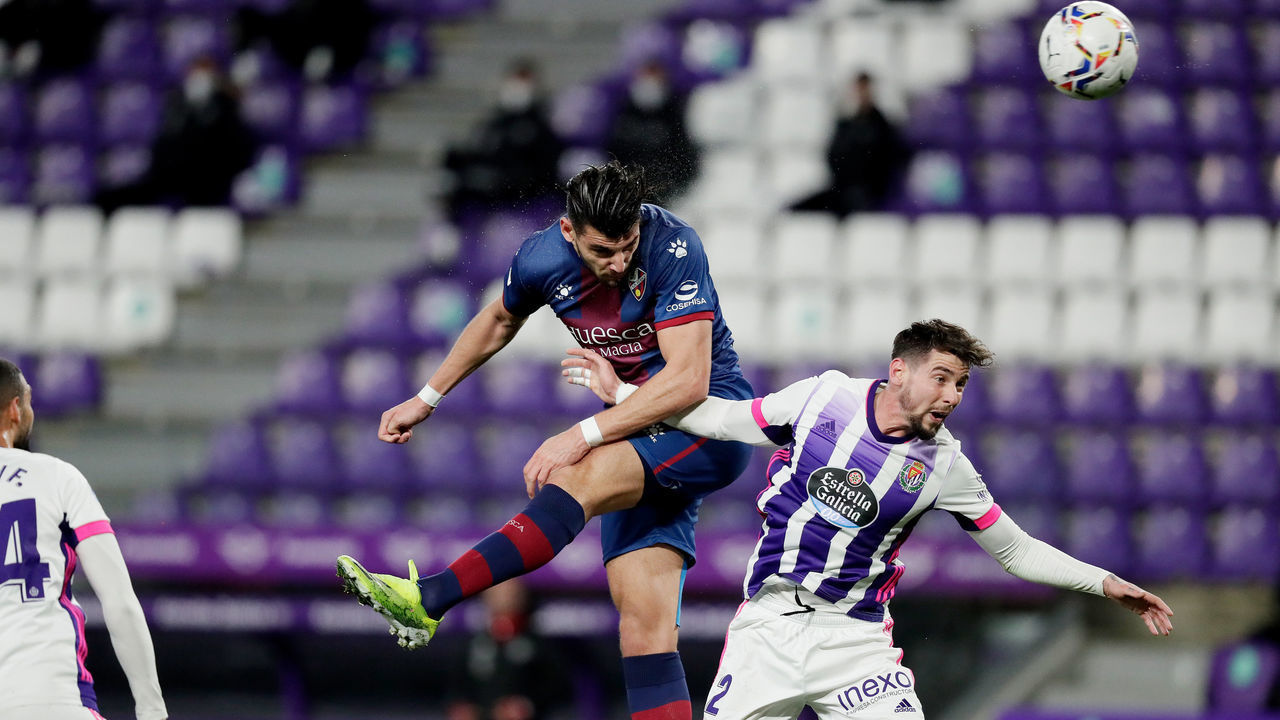 , SPAIN - JANUARY 29: (L-R) Rafa Mir of SD Huesca, Luis Perez of Real Valladolid during the La Liga Santander match between Real Valladolid v SD Huesca at the Jose Zorrilla Stadium on January 29, 2021