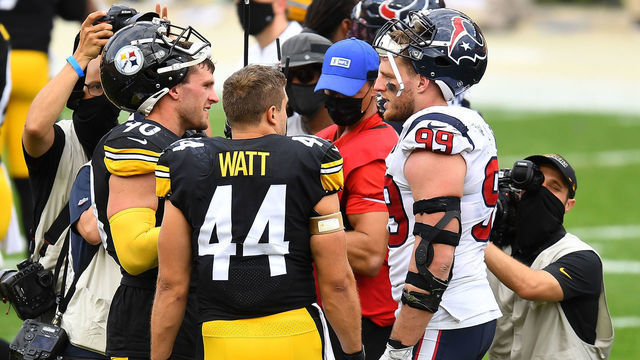 PITTSBURGH, PA - SEPTEMBER 27: T.J. Watt #90, Derek Watt #44 of the Pittsburgh Steelers and J.J. Watt #99 of the Houston Texans talk after Pittsburgh's 28-21 win at Heinz Field on September 27, 2020 in Pittsburgh, Pennsylvania.