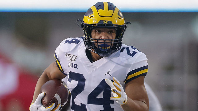 BLOOMINGTON, IN - NOVEMBER 23: Zach Charbonnet #24 of the Michigan Wolverines runs the ball during the first half against the Indiana Hoosiers at Memorial Stadium on November 23, 2019 in Bloomington, Indiana.