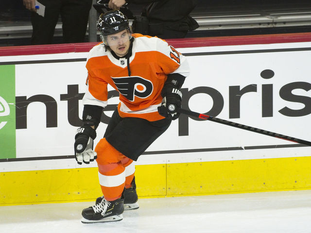 PHILADELPHIA, PA - JANUARY 18: Philadelphia Flyers Right Wing Travis Konecny (11) passes the puck during the game between the Buffalo Sabres and the Philadelphia Flyers on January 18, 2021 at Wells Fargo Center in Philadelphia, PA. (