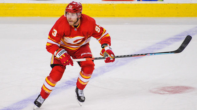 CALGARY, AB - JANUARY 16: Sam Bennett #93 of the Calgary Flames in action against the Vancouver Canucks during an NHL game at Scotiabank Saddledome on January 16, 2021 in Calgary, Alberta, Canada.