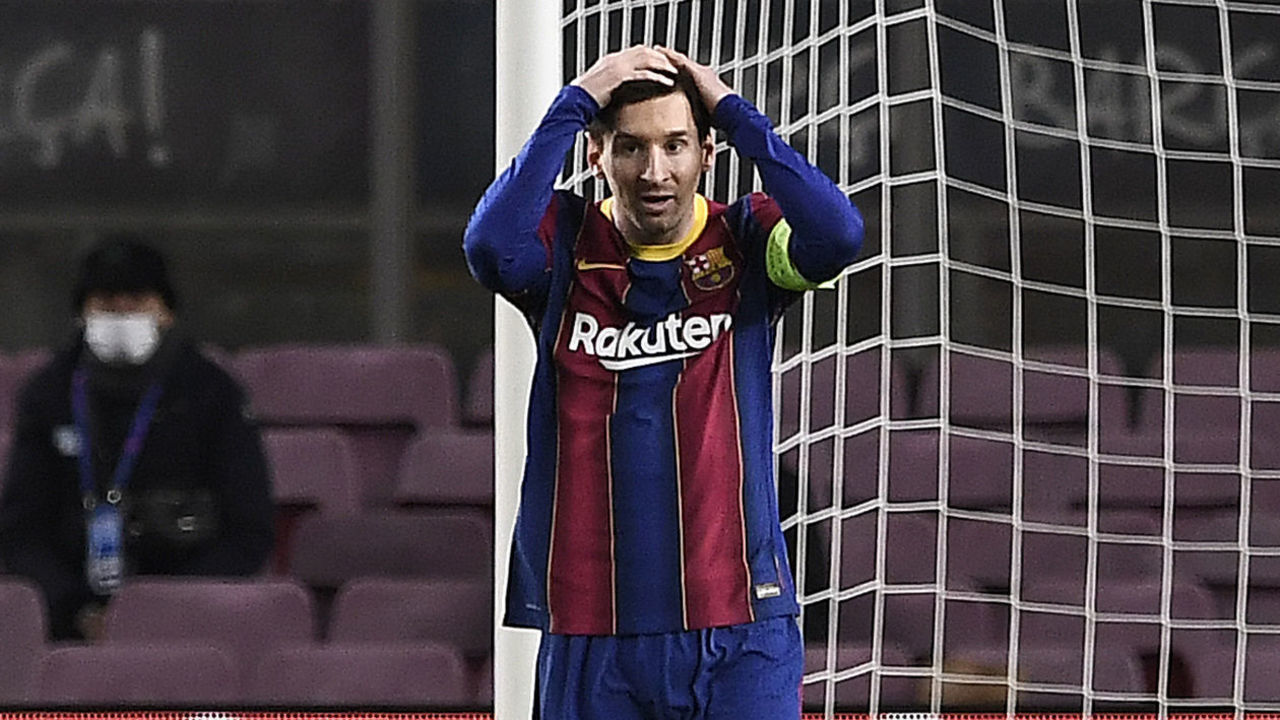 Barcelona's Argentinian forward Lionel Messi reacts after missing a goal opportunity during the UEFA Champions League group G football match between Barcelona and Juventus at the Camp Nou stadium in Barcelona on December 8, 2020.
