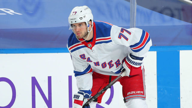 BUFFALO, NY - JANUARY 28: Tony DeAngelo #77 of the New York Rangers prepares for a face-off during an NHL game against the Buffalo Sabres on January 28, 2021 at KeyBank Center in Buffalo, New York.