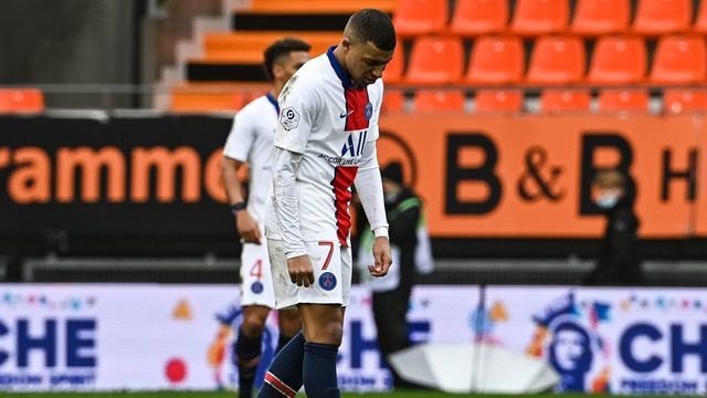Paris Saint-Germain's French forward Kylian Mbappe reacts at the end of the French L1 football match between FC Lorient and Paris Saint-Germain at the Stade Yves-Allainmat stadium, in Lorient, western France, on January 31, 2021.