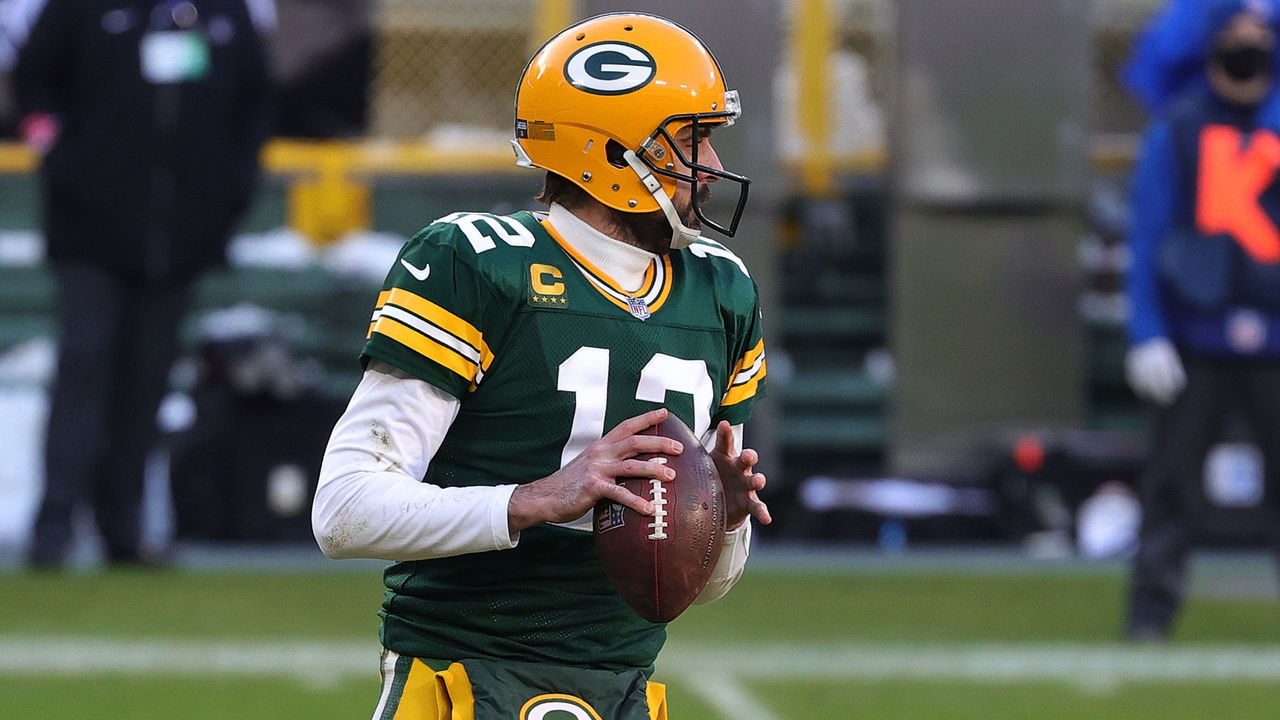 GREEN BAY, WISCONSIN - JANUARY 24: Aaron Rodgers #12 of the Green Bay Packers looks to pass during the NFC Championship game against the Tampa Bay Buccaneers at Lambeau Field on January 24, 2021 in Green Bay, Wisconsin. The Buccaneers defeated the Packers 31-26.
