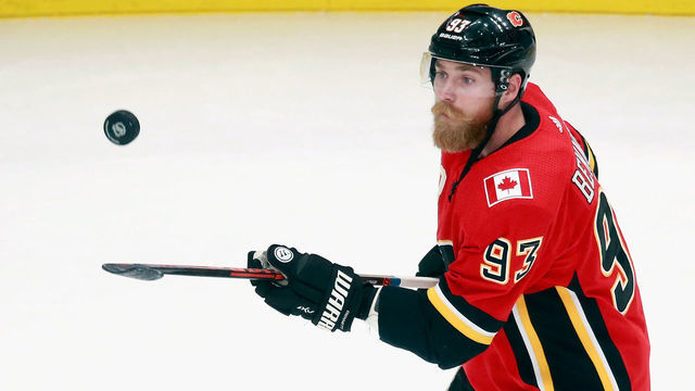 EDMONTON, ALBERTA - AUGUST 20: Sam Bennett #93 of the Calgary Flames juggles the puck during warm-ups prior to the game against the Dallas Stars in Game Six of the Western Conference First Round during the 2020 NHL Stanley Cup Playoffs at Rogers Place on August 20, 2020 in Edmonton, Alberta, Canada.