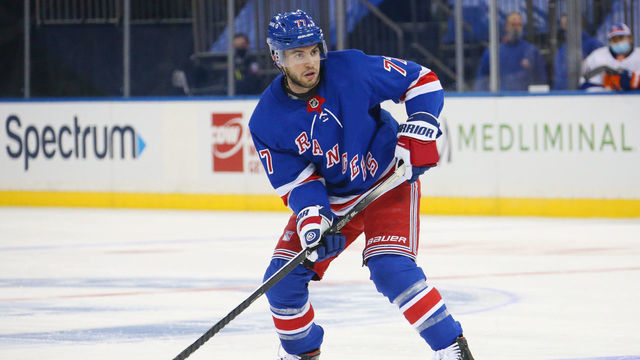 NEW YORK, NY - JANUARY 14: Tony DeAngelo #77 of the New York Rangers skates with the puck against the New York Islanders at Madison Square Garden on January 14, 2021 in New York City. The New York Islanders won 4-0.