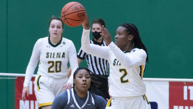 LOUDONVILLE, NY - JANUARY 09: Siena Saints Guard Amari Anthony (2) passes the ball with Rider Broncs Guard Lenaejha Evans (20) defending during the second half of the Womens College Basketball game between the Rider Broncs and the Siena Saints on January 9, 2021, at Alumni Recreation Center in Loudonville, NY.