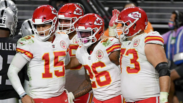 LAS VEGAS, NEVADA - NOVEMBER 22: Quarterback Patrick Mahomes #15 and offensive guard Nick Allegretti #73 congratulate running back Le'Veon Bell #26 of the Kansas City Chiefs after he rushed for a 6-yard touchdown against the Las Vegas Raiders in the second half of their game at Allegiant Stadium on November 22, 2020 in Las Vegas, Nevada. The Chiefs defeated the Raiders 35-31.