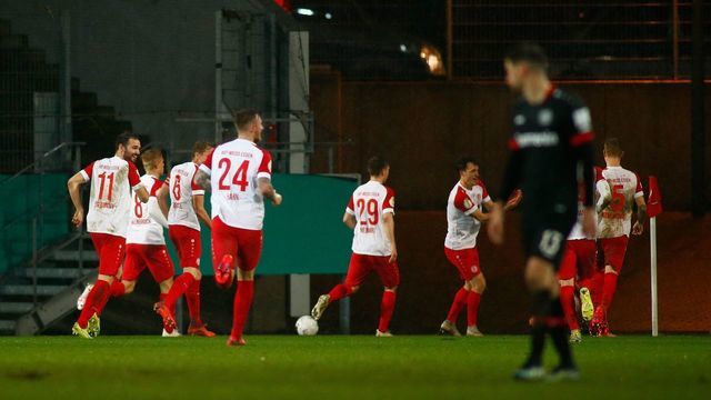 Essen players celebrates scoring during the German Cup (DFB Pokal) last 16 football match Rot-Weiss Essen v Bayer Leverkusen in Essen, western Germany on February 2, 2021.