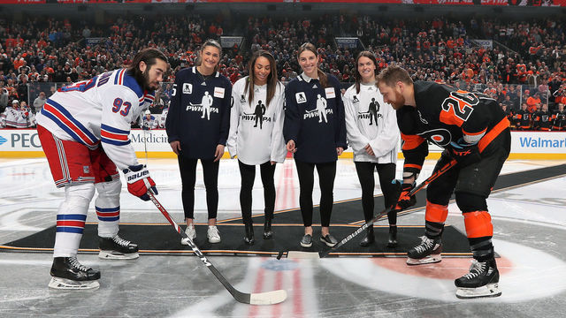 PHILADELPHIA, PA - FEBRUARY 28: Claude Giroux #28 of the Philadelphia Flyers and Mika Zibanejad #93 of the New York Rangers pose for a ceremonial puck drop photo with PWHPA members Megan Keller, Sarah Nurse, Hilary Knight, and Blayre Turnbull on February 28, 2020 at the Wells Fargo Center in Philadelphia, Pennsylvania.