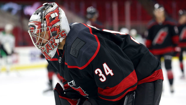 RALEIGH, NC - JANUARY 30: Petr Mrazek #34 of the Carolina Hurricanes looks on during warm ups prior to an NHL game against the Dallas Stars on January 30, 2021 at PNC Arena in Raleigh, North Carolina.