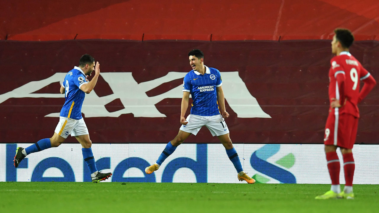 LIVERPOOL, ENGLAND - FEBRUARY 03: Steven Alzate of Brighton and Hove Albion celebrates with team mate Neal Maupay (L) after scoring their side's first goal during the Premier League match between Liverpool and Brighton & Hove Albion at Anfield on February 03, 2021 in Liverpool, England. Sporting stadiums around the UK remain under strict restrictions due to the Coronavirus Pandemic as Government social distancing laws prohibit fans inside venues resulting in games being played behind closed doors.