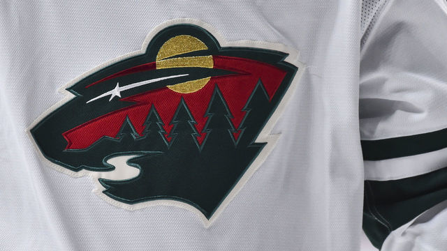 MONTREAL, QC - OCTOBER 17: A detail of the Minnesota Wild logo is seen during the first period against the Montreal Canadiens at the Bell Centre on October 17, 2019 in Montreal, Canada. The Montreal Canadiens defeated the Minnesota Wild 4-0.