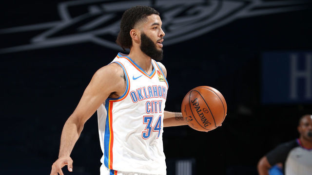 OKLAHOMA CITY, OK - FEBRUARY 3: Kenrich Williams #34 of the Oklahoma City Thunder dribbles the ball during the game against the Houston Rockets on February 3, 2021 at Chesapeake Energy Arena in Oklahoma City, Oklahoma. Mandatory Copyright Notice: Copyright 2021 NBAE