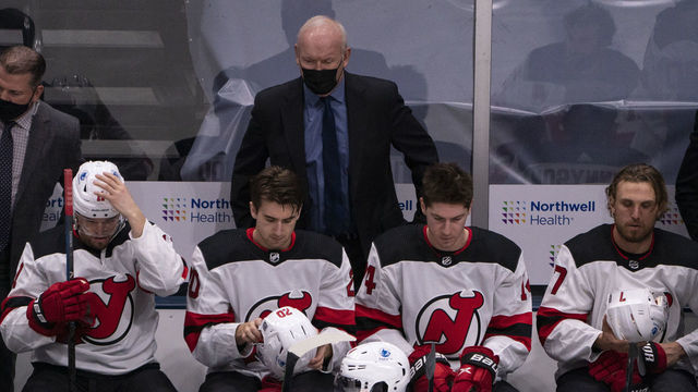UNIONDALE, NY - JANUARY 21: New Jersey Devils Head Coach Lindy Ruff looks on from the bench during the first period of the National Hockey League game between the New Jersey Devils and the New York Islanders on January 21, 2021, at the Nassau Veterans Memorial Coliseum in Uniondale, NY.