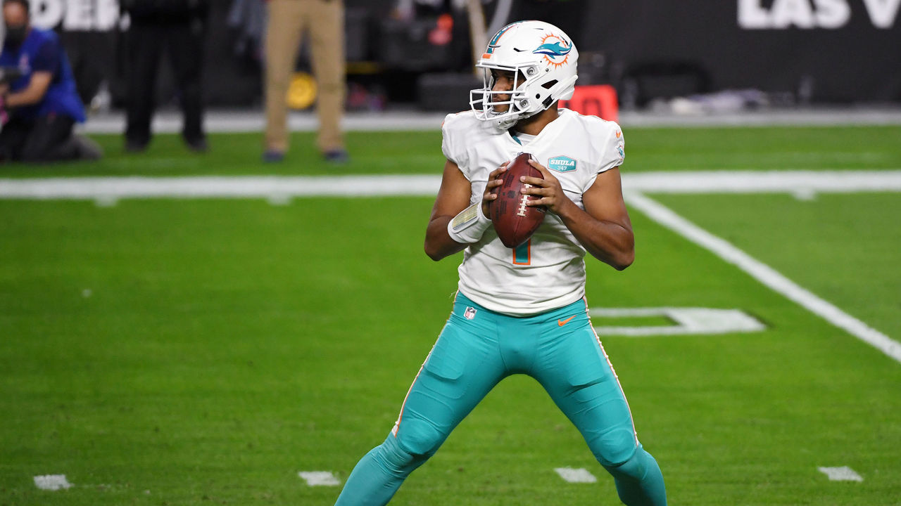LAS VEGAS, NEVADA - DECEMBER 26: Quarterback Tua Tagovailoa #1 of the Miami Dolphins looks to throw against the Las Vegas Raiders in the first half of their game at Allegiant Stadium on December 26, 2020 in Las Vegas, Nevada. The Dolphins defeated the Raiders 26-25.