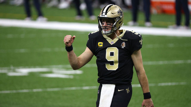 NEW ORLEANS, LOUISIANA - JANUARY 10: Drew Brees #9 of the New Orleans Saints celebrates a touchdown scored by Alvin Kamara #41 (not pictured) against the Chicago Bears during the fourth quarter in the NFC Wild Card Playoff game at Mercedes Benz Superdome on January 10, 2021 in New Orleans, Louisiana.
