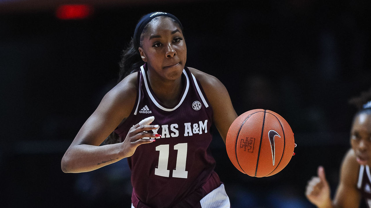 KNOXVILLE, TN - FEBRUARY 16: Texas A&M Aggies guard Kayla Wells (11) brings the ball up court during the first half against the Tennessee Lady Vols on February 16, 2020, at Thompson-Boling Arena in Knoxville, TN.