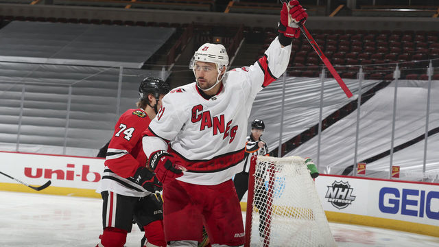 CHICAGO, ILLINOIS - FEBRUARY 04: Nino Niederreiter #21 of the Carolina Hurricanes reacts after his goal against the Chicago Blackhawks in the second period at the United Center on February 04, 2021 in Chicago, Illinois.