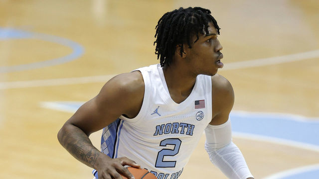 CHAPEL HILL, NORTH CAROLINA - JANUARY 02: Caleb Love #2 of the North Carolina Tar Heels brings the ball up court during the first half of their game against the Notre Dame Fighting Irish at Dean Smith Center on January 02, 2021 in Chapel Hill, North Carolina.