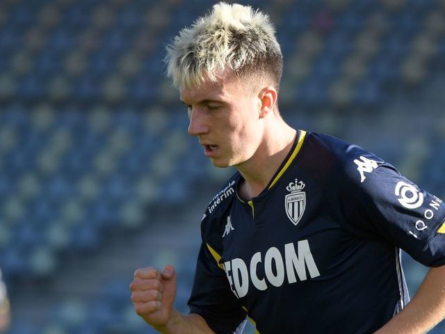 Monaco's Russian midfielder Aleksandr Golovin celebrates after scoring a goal during the French L1 football match between Nimes and Monaco at the Costieres Stadium in Nimes on February 7, 2021.