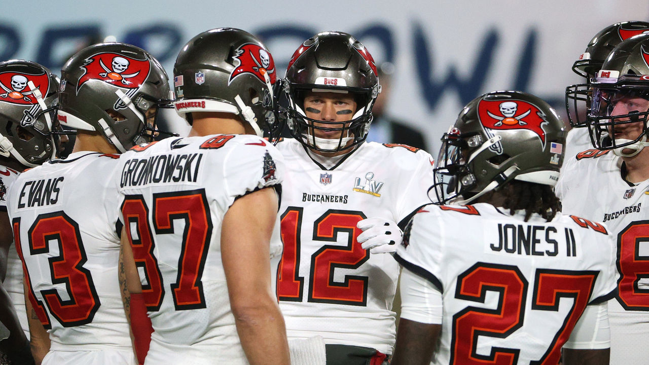 TAMPA, FLORIDA - FEBRUARY 07: Tom Brady #12 of the Tampa Bay Buccaneers huddles with teammates in the first quarter against the Kansas City Chiefs in Super Bowl LV at Raymond James Stadium on February 07, 2021 in Tampa, Florida.
