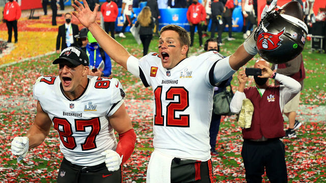 TAMPA, FLORIDA - FEBRUARY 07: Rob Gronkowski #87 and Tom Brady #12 of the Tampa Bay Buccaneers celebrate after defeating the Kansas City Chiefs in Super Bowl LV at Raymond James Stadium on February 07, 2021 in Tampa, Florida. The Buccaneers defeated the Chiefs 31-9.