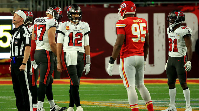 TAMPA, FLORIDA - FEBRUARY 07: Tom Brady #12 of the Tampa Bay Buccaneers stands across Chris Jones #95 of the Kansas City Chiefs during the second quarter of the game in Super Bowl LV at Raymond James Stadium on February 07, 2021 in Tampa, Florida.