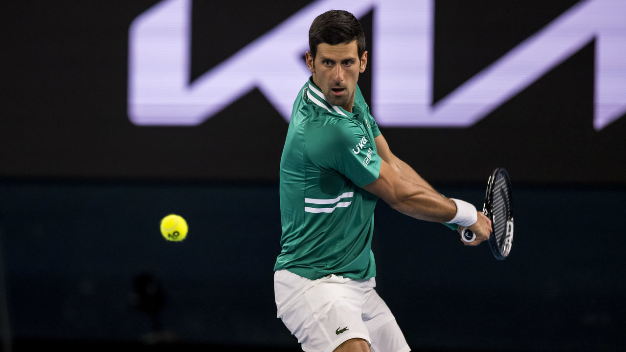 MELBOURNE, VIC - FEBRUARY 08: Novak Djokovic of Serbia returns the ball during round 1 of the 2021 Australian Open on February 8 2020, at Melbourne Park in Melbourne, Australia.